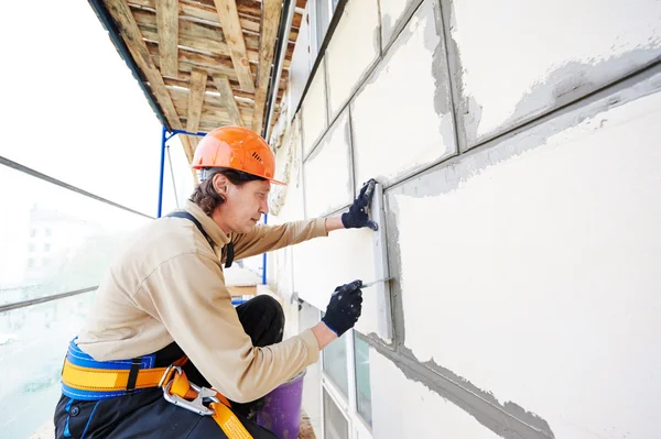 Facade builder plasterer at work — Stock Image Facade builder plasterer at work Stock Image