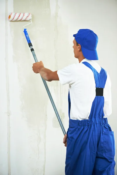 Painter at home renovation work with prime — Stock Photo, Image