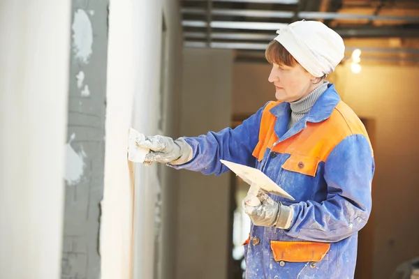 Plasterer at indoor wall work — Stock Photo, Image