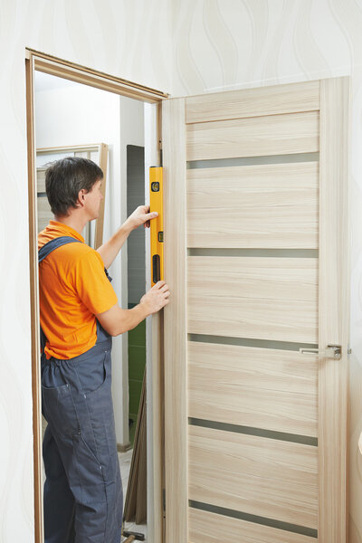 Carpenter works with level