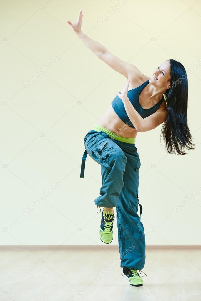Zumba dancing fitness exercises Stock Photo by ©kalinovsky 68410725
