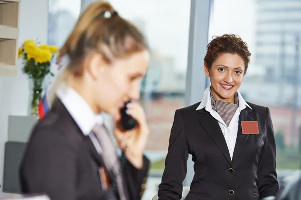 Hotel workers on reception — Stock Photo, Image