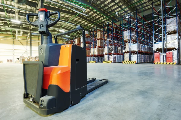 Pallet stacker truck at warehouse — Stock Photo, Image