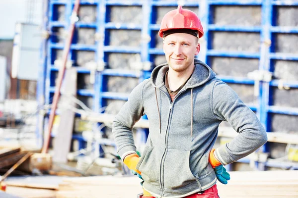 Builder worker at construction site — Stock Photo, Image