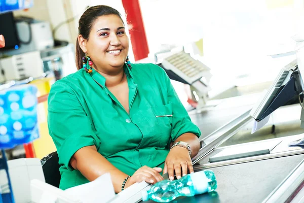 Shopping. Cashdesk cashier worker in supermarket — Stock Photo, Image