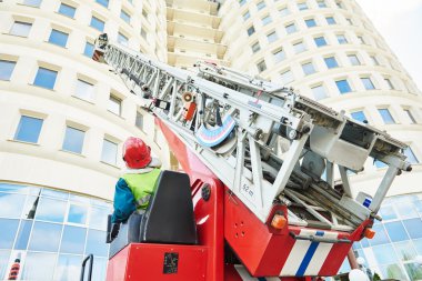 fireman during extinguish a fire clipart