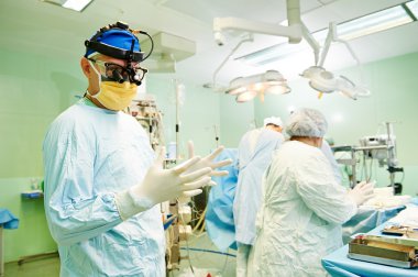 surgeons team at cardiac surgery operation clipart