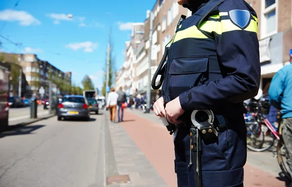 City security. policeman in the street — Stock Photo, Image