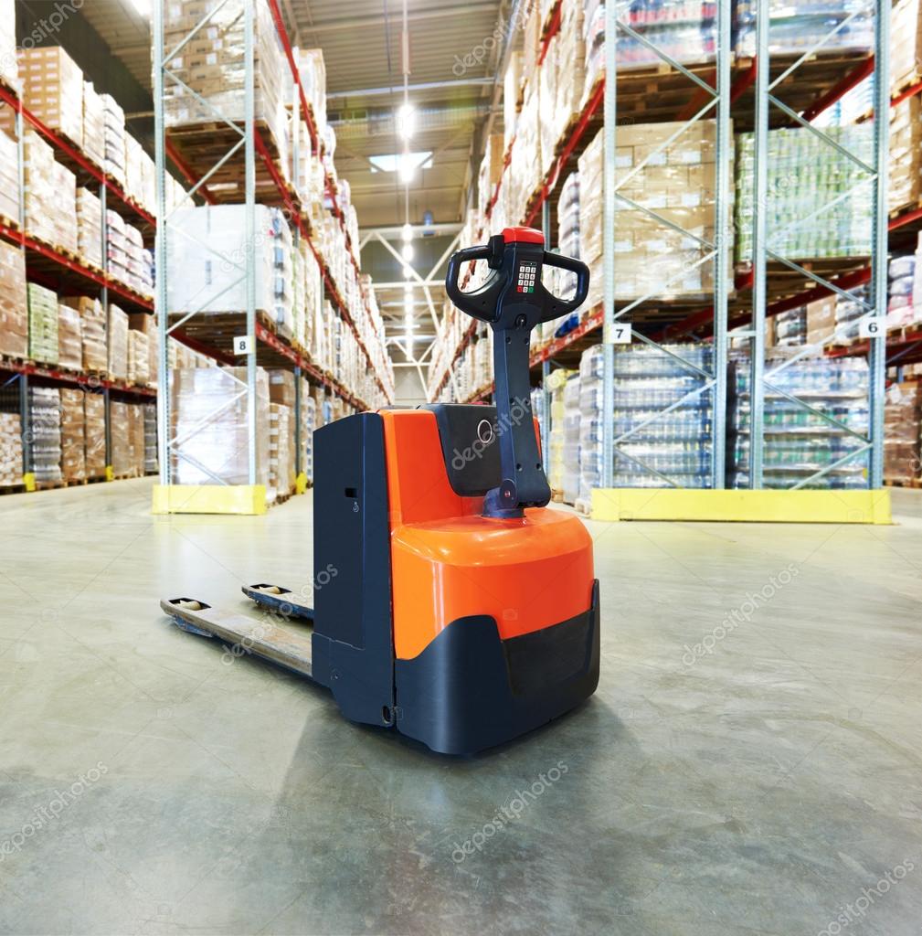 Pallet stacker truck at warehouse — Stock Photo © kalinovsky 75472683