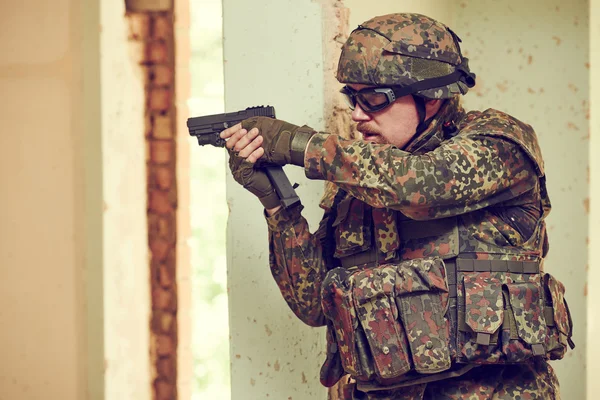 Military soldier with pistol — Stock Photo, Image