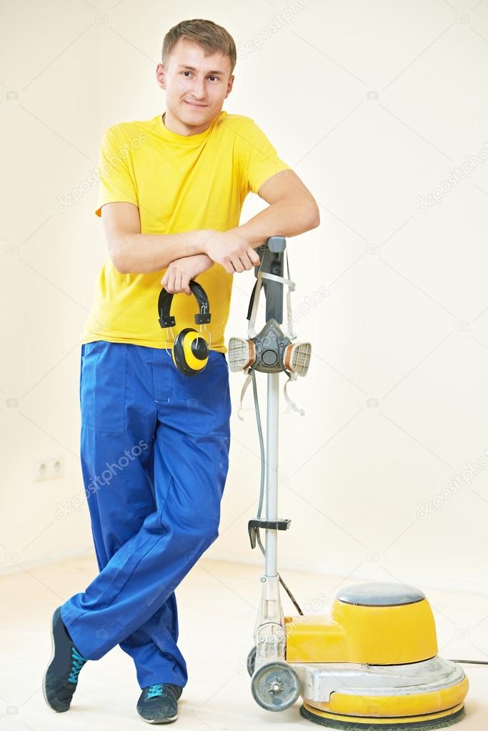 parquet floor worker with polishing machine