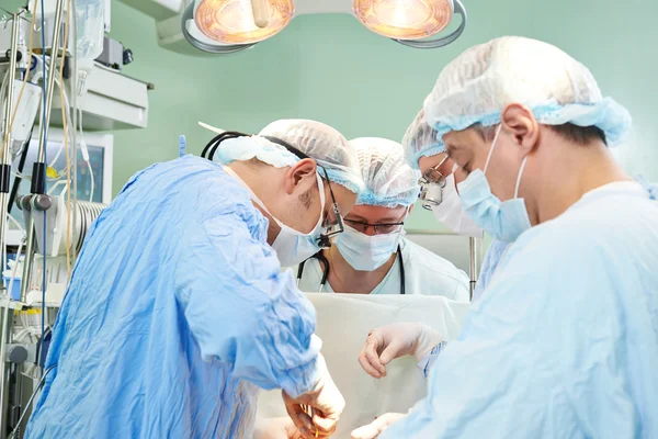 Surgeons team at operation — Stock Photo, Image