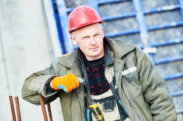 Builder concreter  worker at construction site — Stock Photo, Image