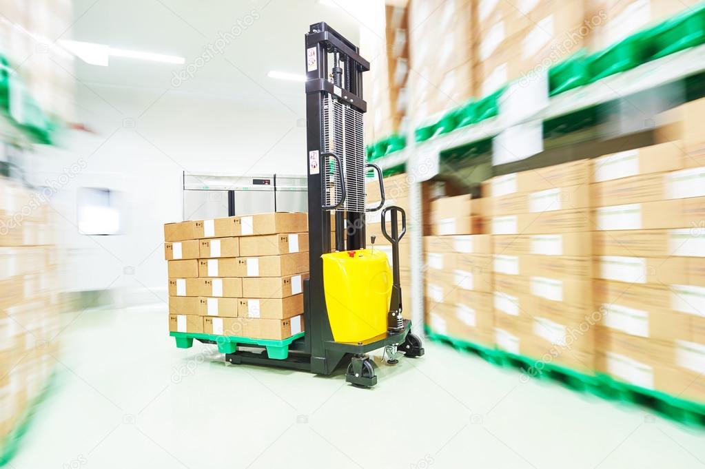 loader stacker at warehouse