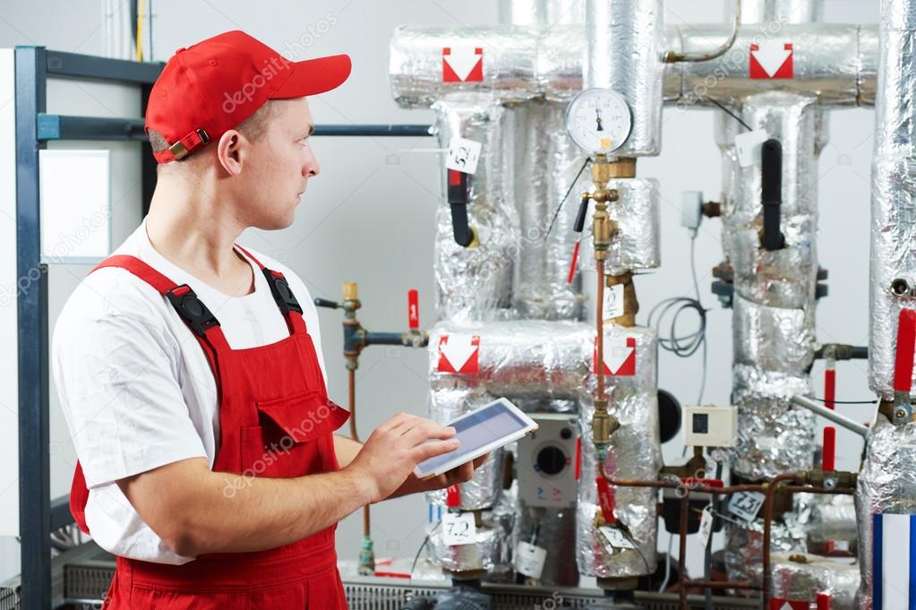 Boiler heating system inspection Stock Photo by ©kalinovsky 90870364