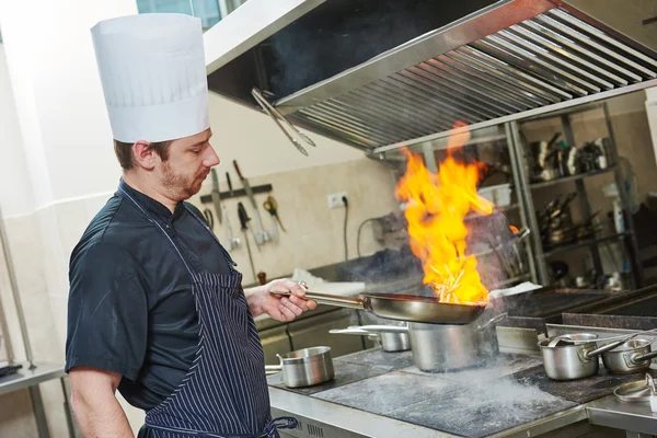 Chef cook doing flambe — Stock Photo, Image