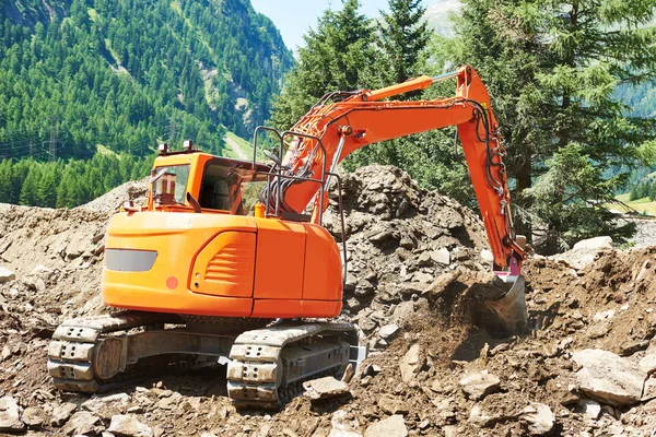 Excavadora cargadora máquina en el sitio de construcción —  Fotos de Stock