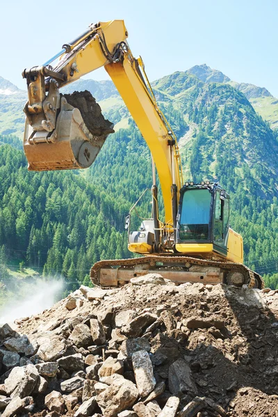 Excavadora cargadora máquina en el sitio de construcción — Foto de Stock