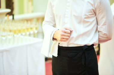 Waiter ready to service at party clipart
