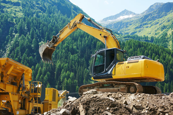 excavator loader machine at construction site