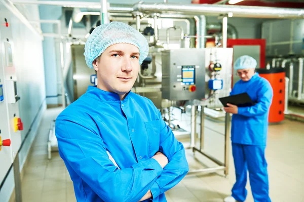 Pharmaceutical man worker operating air conditioning equipment — Stock Photo, Image
