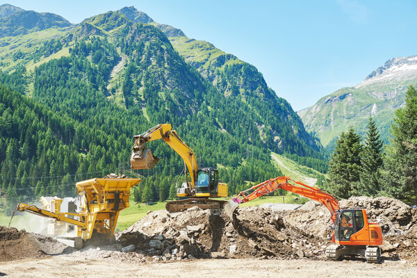 excavator and stone crusher machine