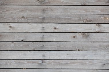 Eski ahşap tahtalardan kırsal çitler.