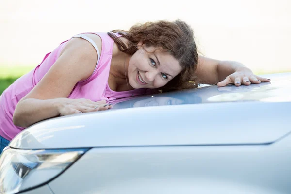 Joyful Caucasian Young Woman Laying Car Bonnet — Stock Photo, Image