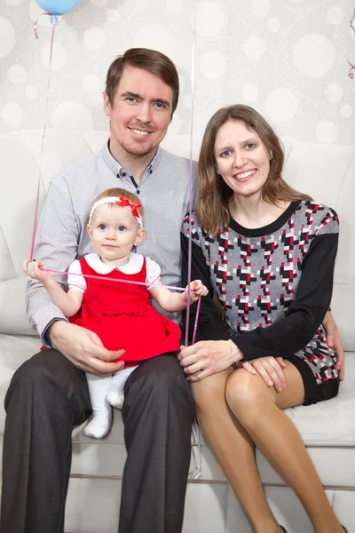 Three People Caucasian Family Sitting Sofa - Stock-foto