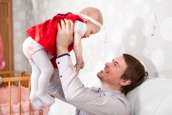 Father Holding Baby Girl Stretched Hands Two People - Stock-foto