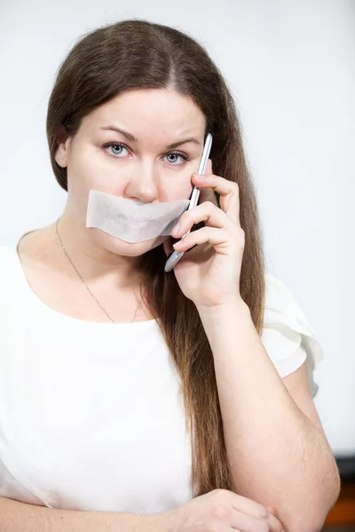 Sad Caucasian Woman Cellphone Tape Her Mouth Grey Background — Stock Photo, Image