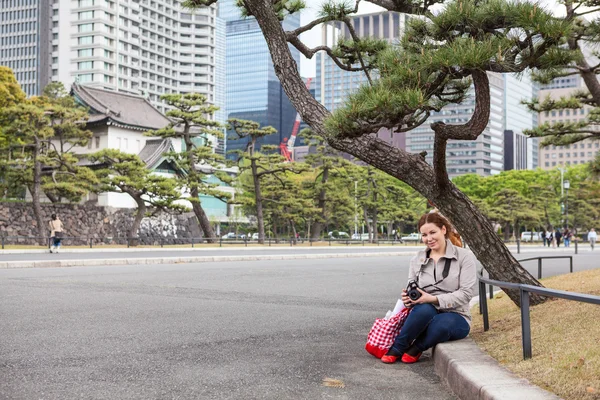 European Woman Tourist Camera Sitting Garden Tokyo Imperial Palace Japan — Stock Photo, Image