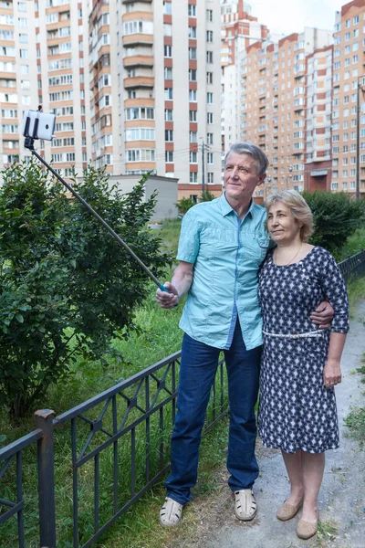 Mature People Using Selfie Stick Man Holding Monopod Smartphone Hand — Stock Photo, Image