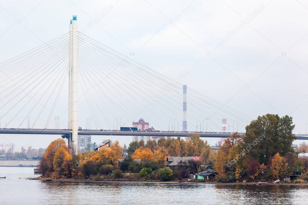 The Bolshoi Obukhovsky Bridge across the Neva River in the Saint Petersburg, Russia at autumn season. It is not a drawbridge