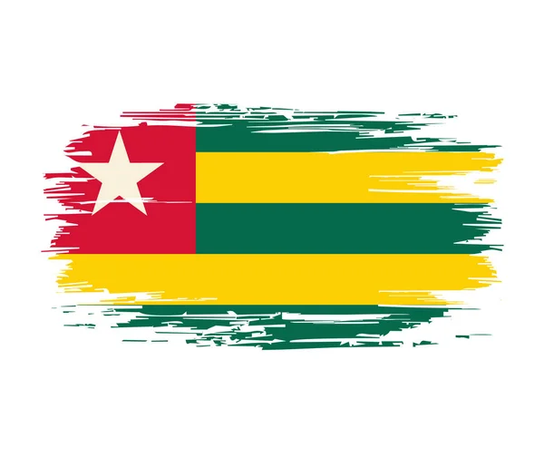 Togolski pędzel flagowy grunge tle. Ilustracja wektora. — Wektor stockowy