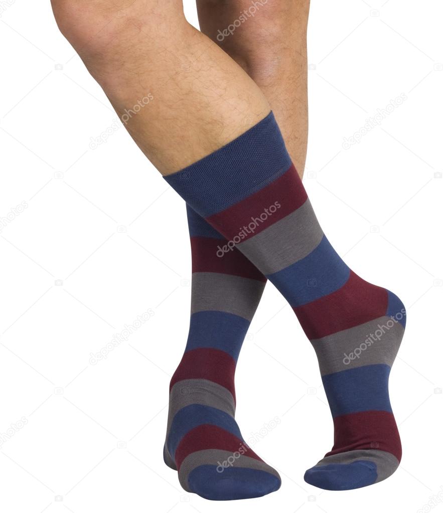 Male legs in socks. Isolated on white background