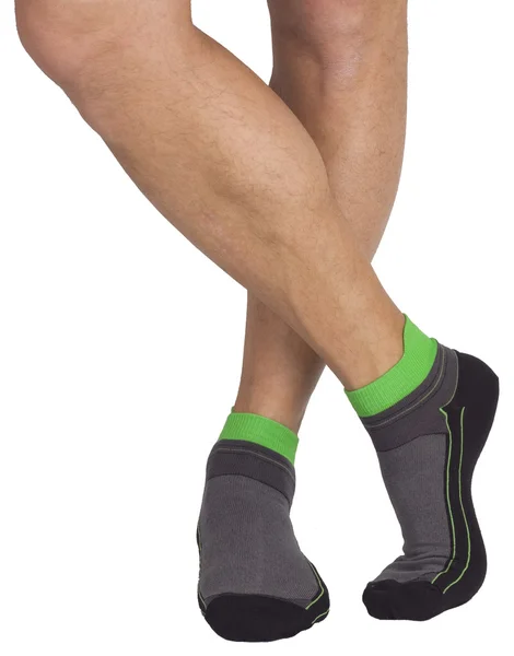 Pernas masculinas em meias. Isolado em branco — Fotografia de Stock