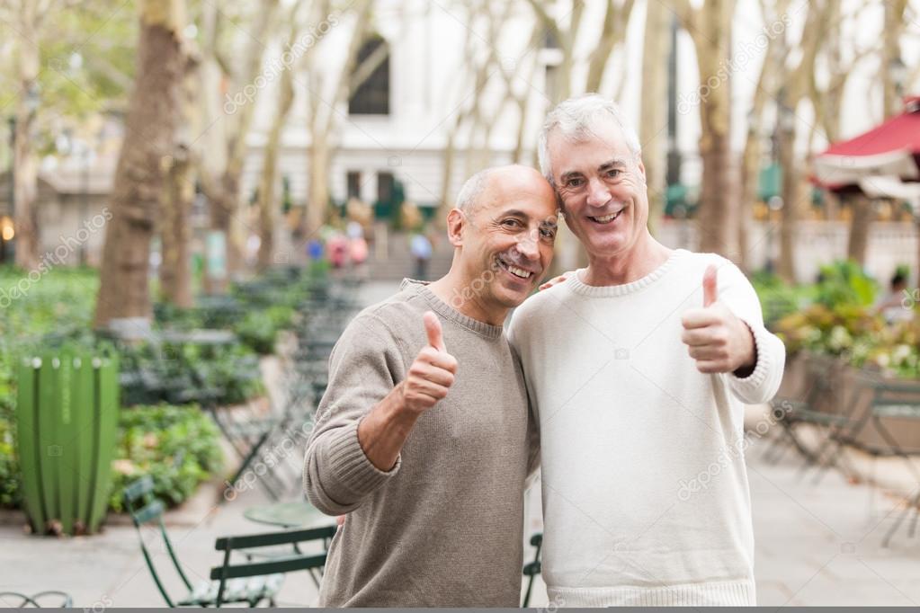 Gay Couple showing Thumbs Up