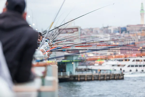 Fishing poles on Galata Bridge in Istanbul — Stock Photo, Image