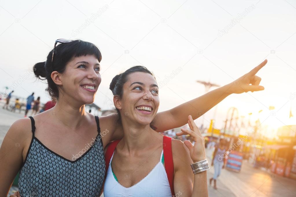 Beautiful Young Women in Coney Island at Sunset