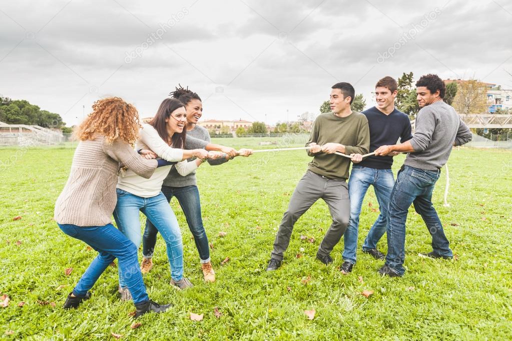 Multiracial People Playing Tug of War