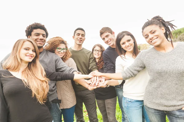 Freunde mit Hands in Stack — Stockfoto