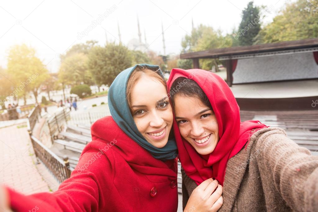 Arab Women Wearing Veil Taking Selfie in Istanbul