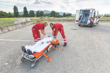 Rescue Team Providing First Aid