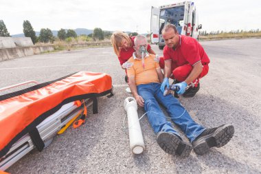 Rescue Team Providing First Aid