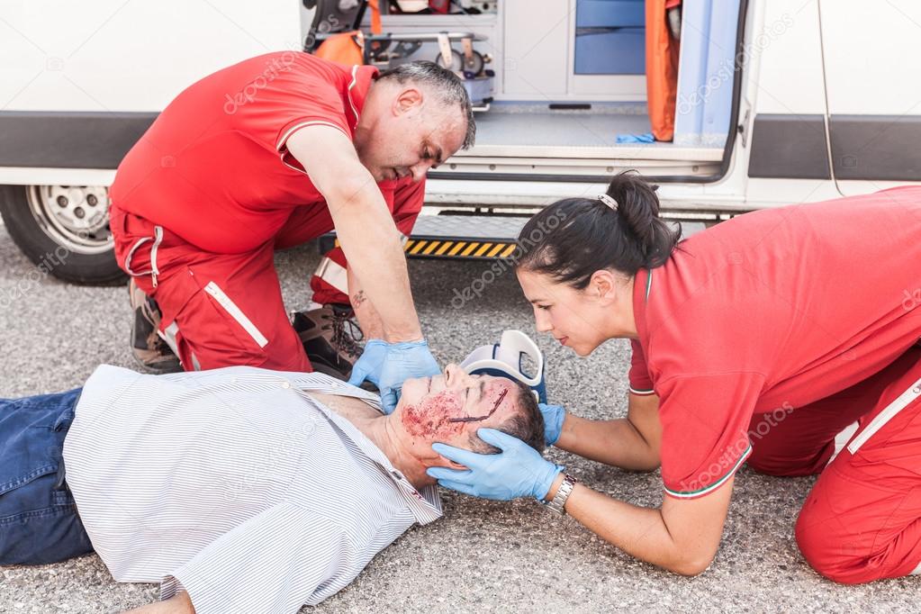 Rescue Team Providing First Aid