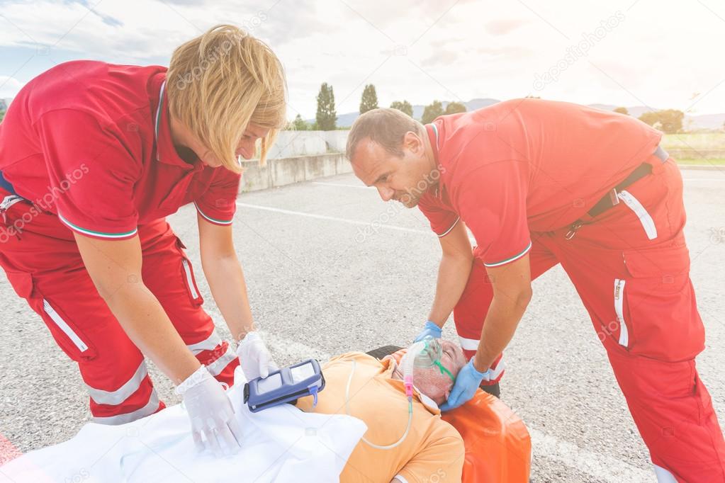 Rescue Team Providing First Aid