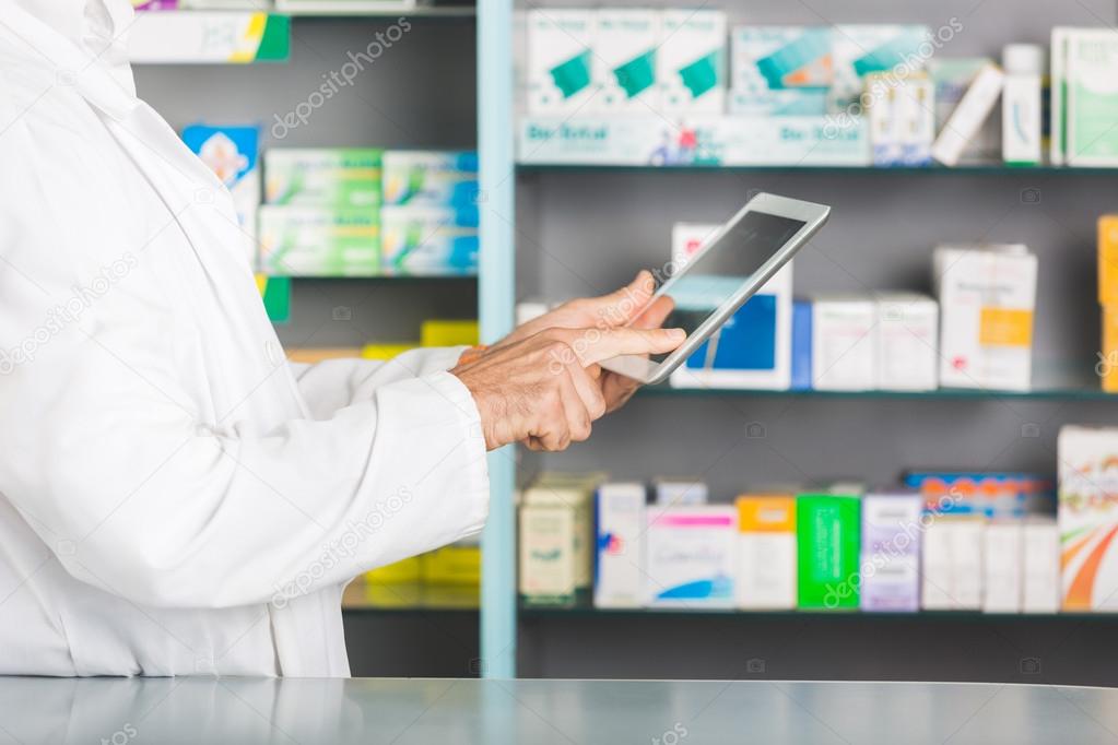 Pharmacist with Digital Tablet