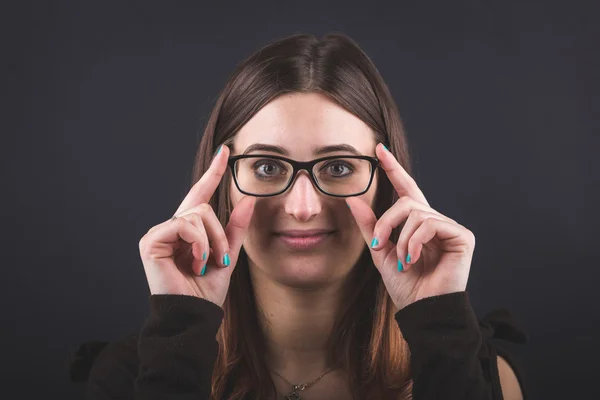 Young Woman with Eyesight Problems on Black Background. — Stock Photo, Image
