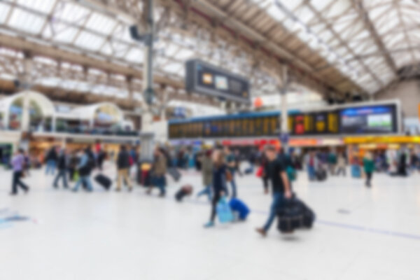 Crowded station during rush hour in London, blurred background